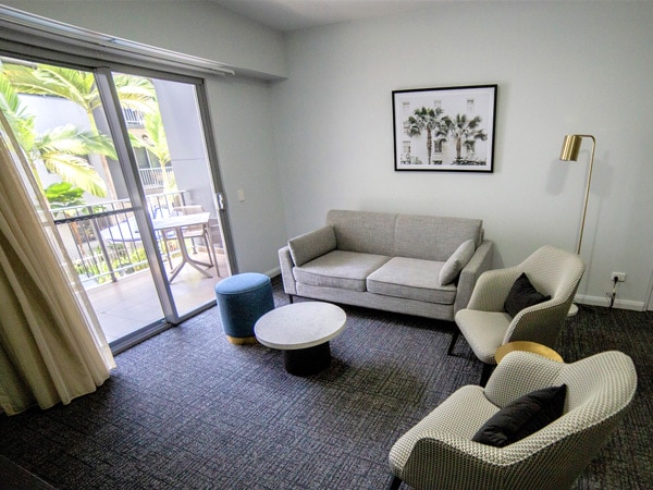 the lounge room facing the balcony at Hudson Parap