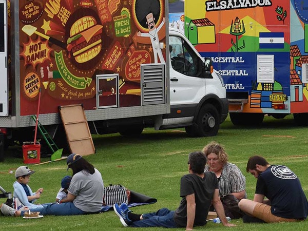 people having a picnic on the grounds at Aussie Night Markets