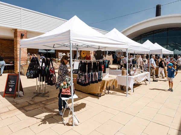 market stalls lined up along Christmas Wollemi Artisan Markets, Katoomba