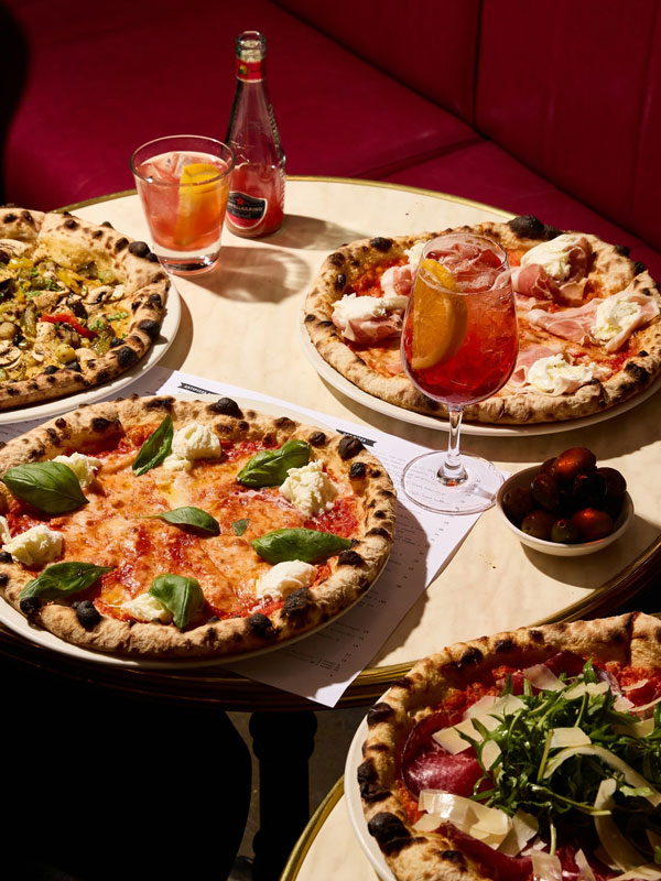 a wide selection of pizza with drinks at D.O.C Pizza & Mozzarella Bar, Carlton