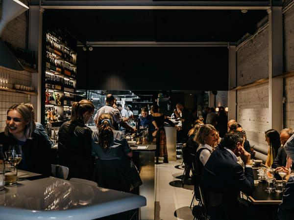the dimly lit dining interior at Lagoon Dining, Carlton