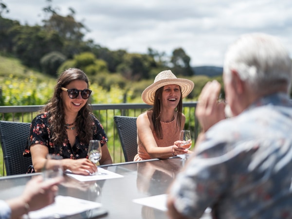 guests enjoying long lunch at Freycinet Vineyard