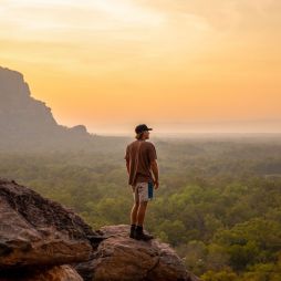 a man standing on top of Nawurlandja Lookout