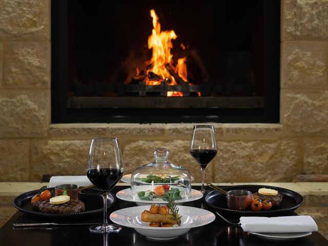intimate dining by the fire at The Gates Restaurant, Hunter Valley