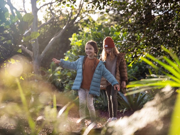 Kids playing in The Ian Potter Children's Wild Play Garden, Centennial Park