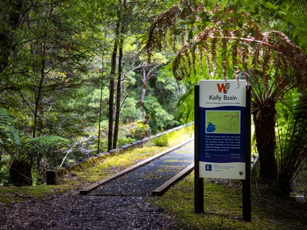 the Kelly Basin signage surrounded by lush greenery