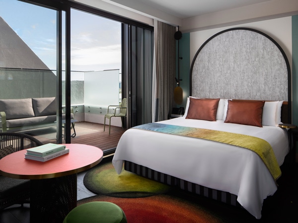 the king room with a balcony at QT Newcastle