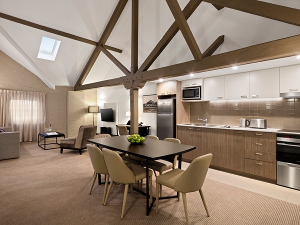the two-bedroom accommodation with kitchen and dining at Quest Newcastle West