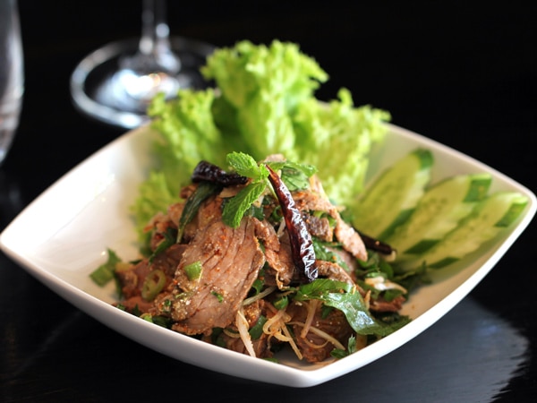 a farm-to-table dish with fresh veggies at Spice I Am