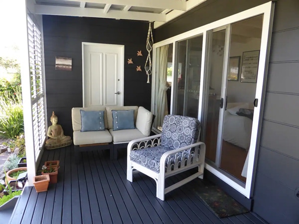 outdoor seating area on the terrace at the Beach Cottage in Merimbula