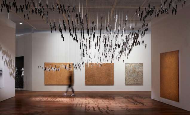 Woman at an exhibition inside the Art Gallery of NSW in Sydney