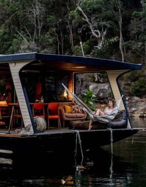 Women in hammock onboard Oh Buoy houseboat on the Hawkesbury