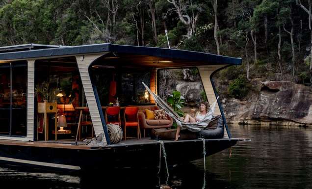 Women in hammock onboard Oh Buoy houseboat on the Hawkesbury