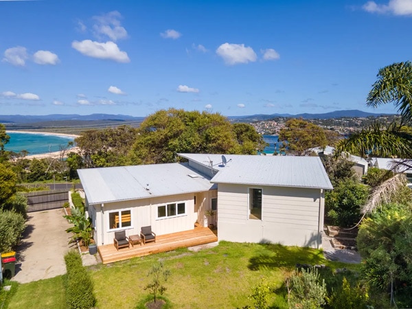 a drone shot of Shack with a View Airbnb, Merimbula