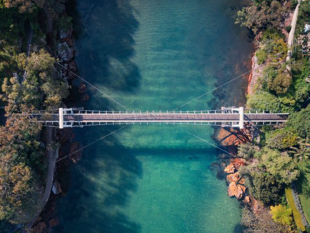 a suspended bridge over Parsley Bay