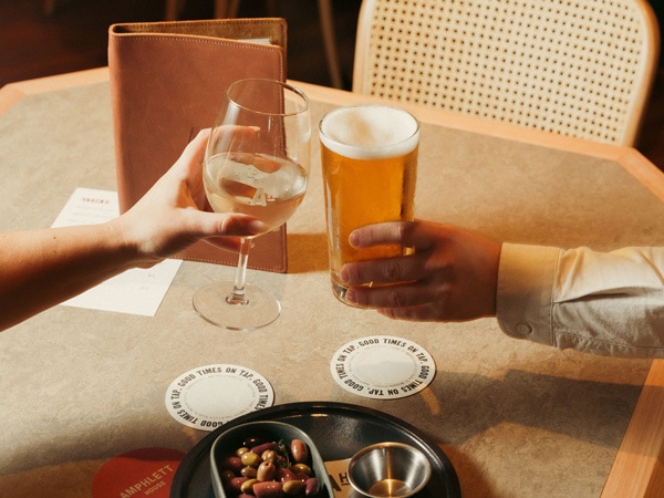 clinking glasses on the table at Amphlett House