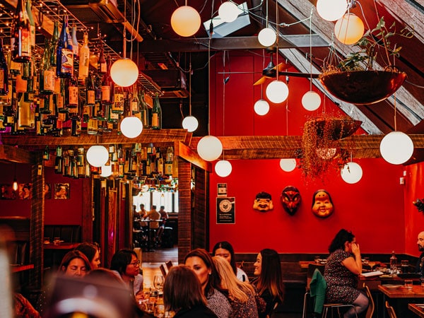 the dimly lit interior of Bar Wa Izakaya