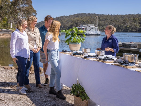 guests at Broadwater Oysters learning about commercial oyster farming