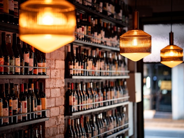 the wine display inside Officina Gastronomica Italiana