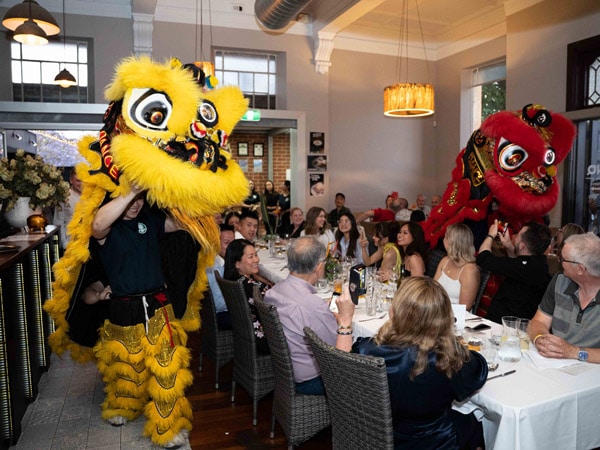a lion dance at dinner, NNQ Vietnamese