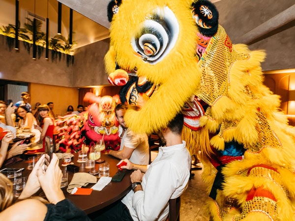 diners enjoying the lion dance at Southside, Brisbane