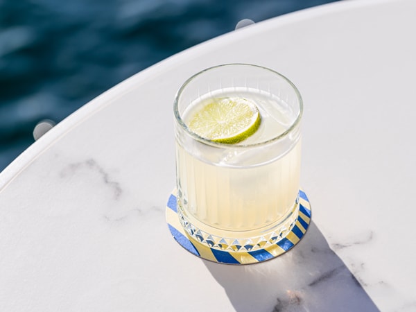a glass of cocktail at Pier Bar at Pier One Sydney Harbour