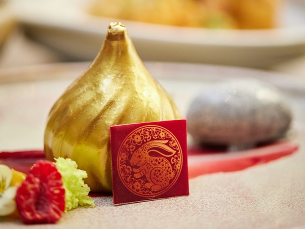 a golden garlic lucky charm at Silks, Perth