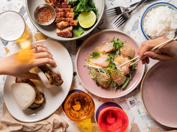 a table-top view of Southeast Asian dishes at Easy Tiger
