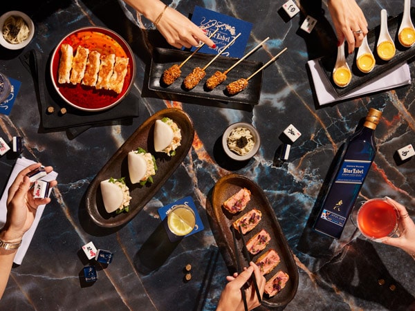 rock lobster bao and wagyu skewers at Est