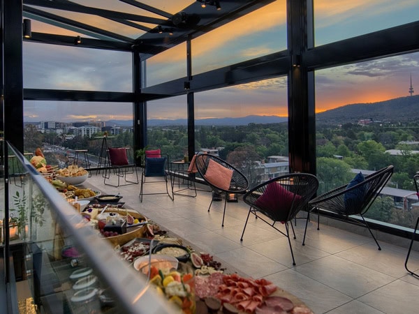 the rooftop terrace with floor-to-ceiling windows at Leyla Bar