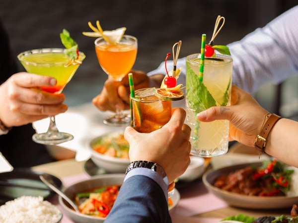 raising cocktail glasses at Mr Good Guy, Tasmania