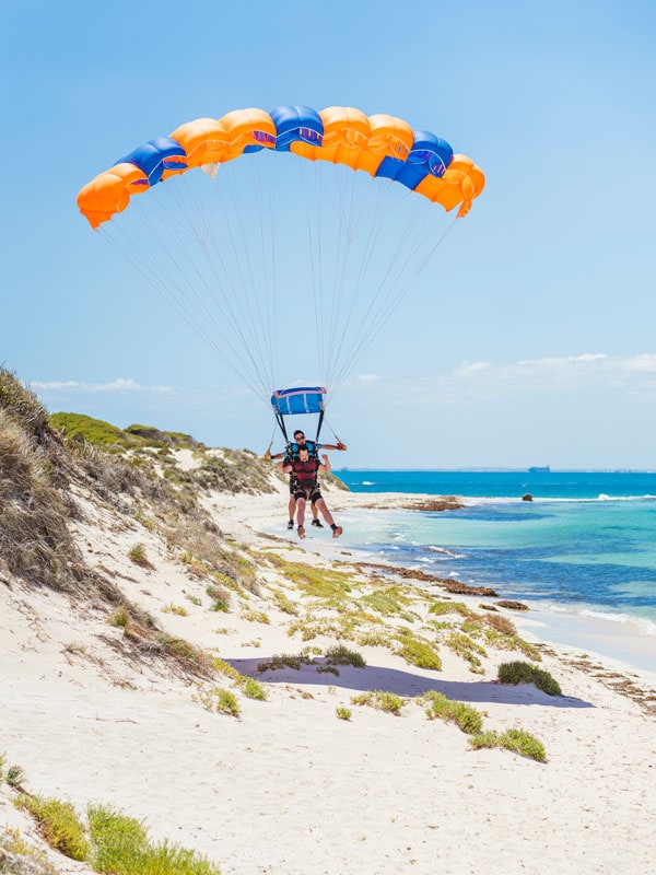 landing on a white-sand beach with Skydive Geronimo