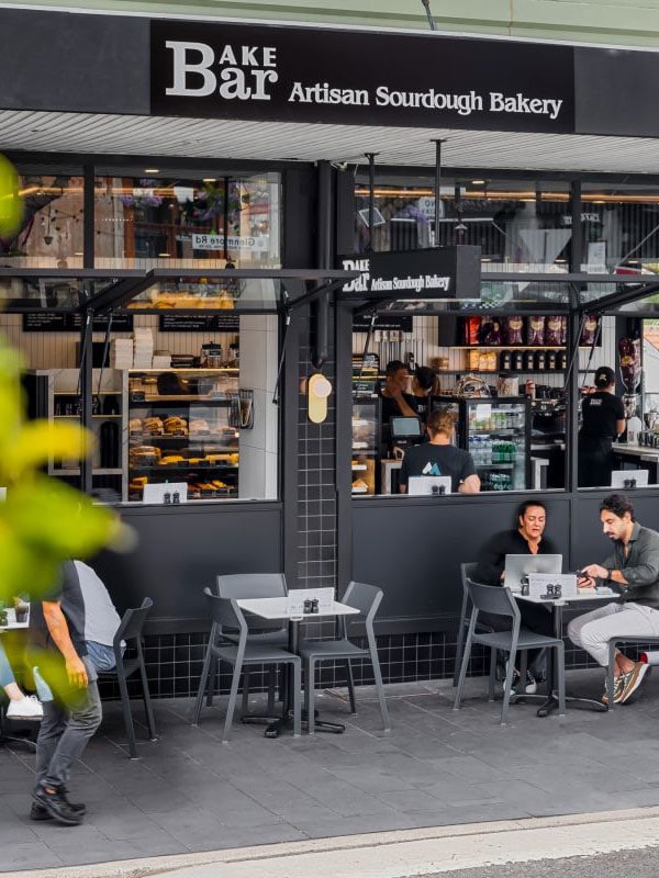 people dining outside Bake Bar, Paddington