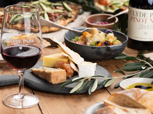 food and wine on the table at Clyde Park