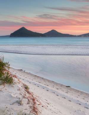 Windy sunset from Winda Woppa Reserve, overlooking Wind Woppa Lagoon and views to Mt Tomaree, Stephens Peak and Shoal Bay.
