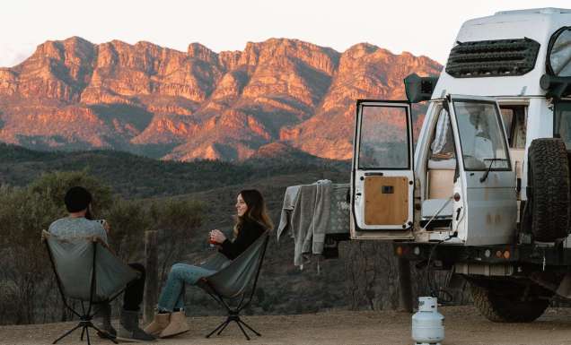 Couple sitting on camping chairs at Bunyeroo Valley Lookout