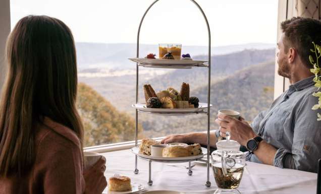Couple enjoying the views at Hydro Majestic Wintergarden High Tea