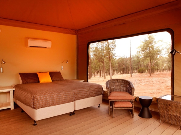 the bed inside the Ikara Safari tent