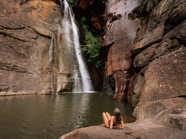 a reclining woman in the waterfall at Ngarrabullgan Gorge