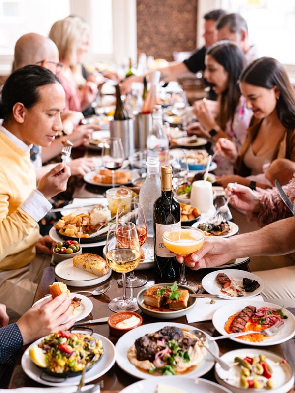 people feasting on Spanish dishes at Bocados Spanish Kitchen, Newcastle