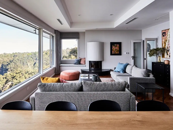 the living room at Cloud Parade with views of the Three Sisters and Mount Solitary