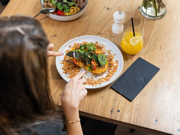 Woman dines at Field Black 