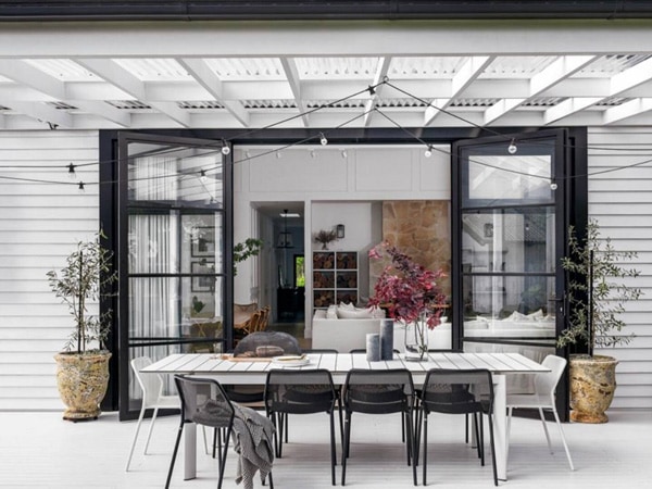 an outdoor dining area at Orchard Cottage, Leura