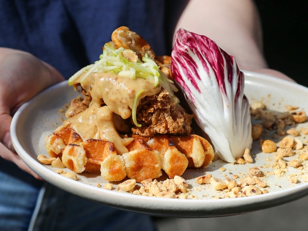 a close-up shot of waffles on a plate at Paramount Coffee Project, Surry Hills