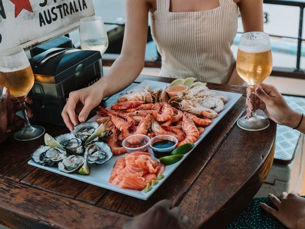 Friends dine at Prawn Star in Mooloolaba