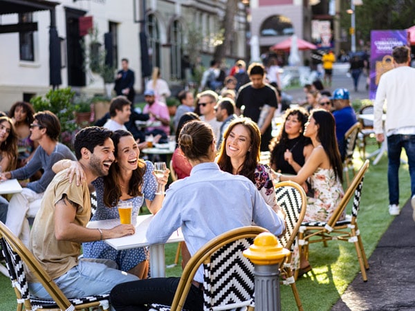 friends enjoying drinks at The Orient Hotel, The Rocks