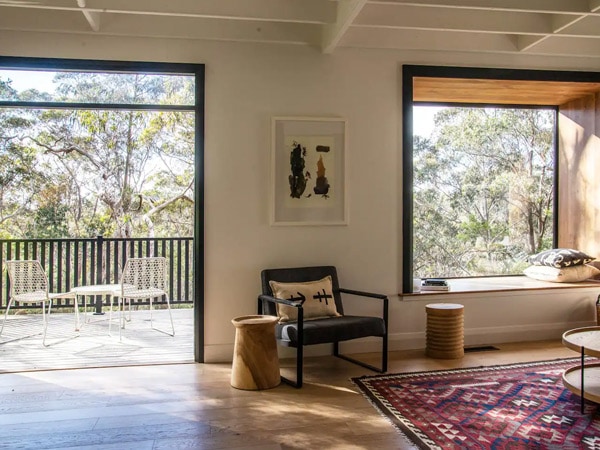 a look inside Wondernest accommodation with windows and balcony