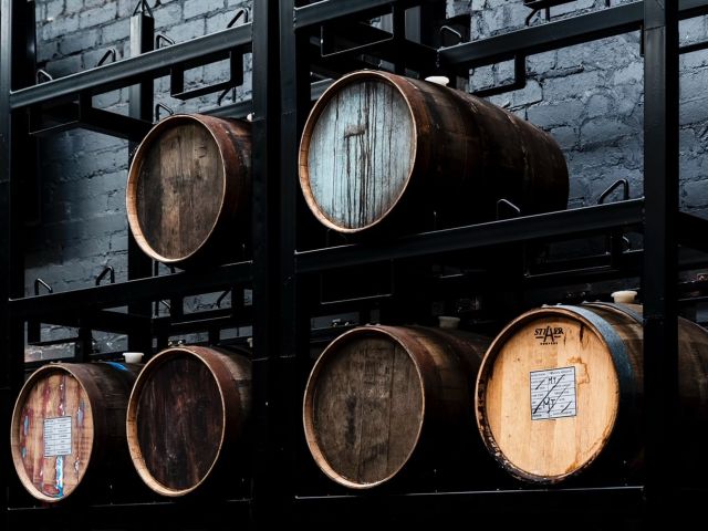 a stack of wine barrels at Bathtub Gin Co., Williamstown