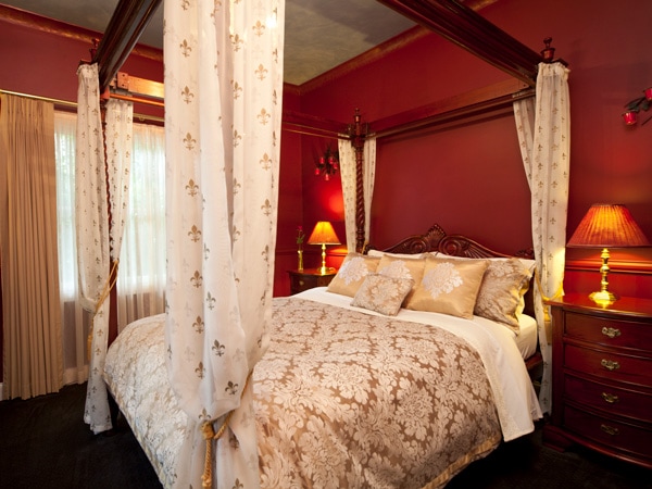 the vintage red bedroom at Strawberry Patch Cottage