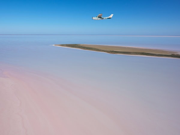 a helicopter above Kati Thanda-Lake Eyre, SA